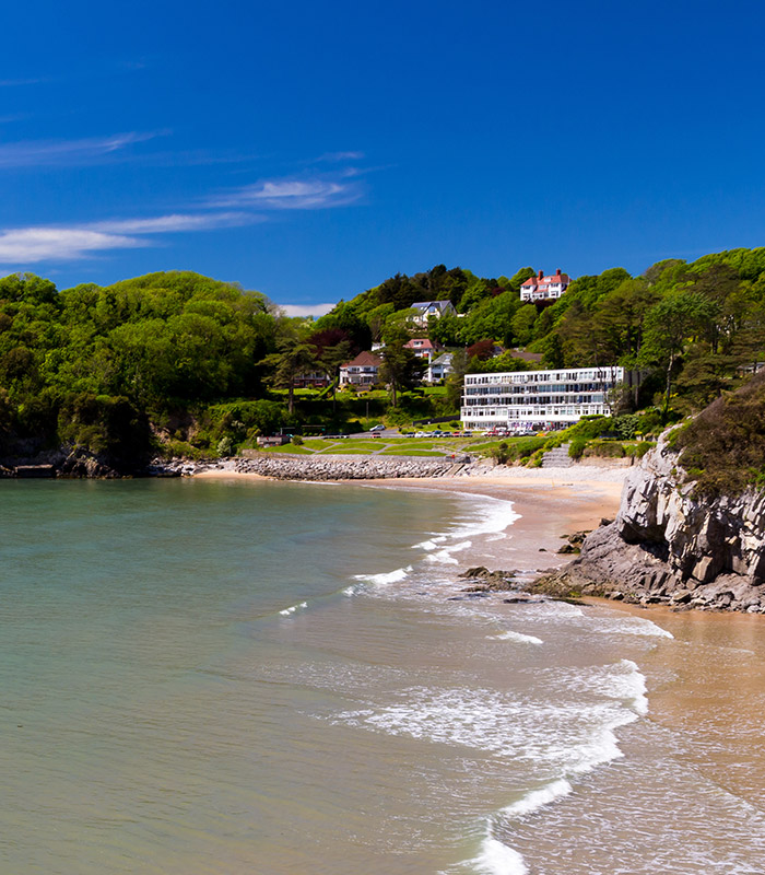 Panoramic view of the beach with hills in the background